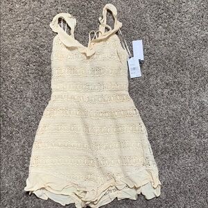 Cream Lace romper.